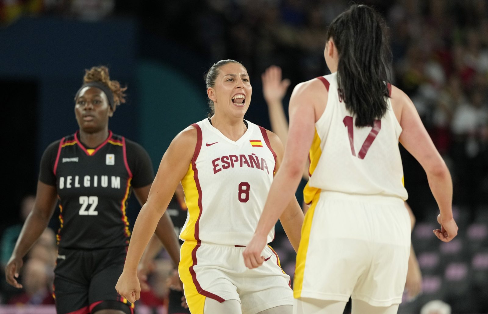 Aug 7, 2024; Paris, France; Spain power forward Maria Araujo (8) celebrates with center Megan Gustafson (17) in the first quarter against Belgium during the Paris 2024 Olympic Summer Games at Accor Arena.