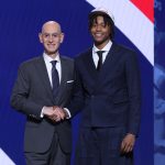 Tre Johnson stands with NBA commissioner Adam Silver after being selected as the sixth pick by the Washington Wizards in the first round of the 2025 NBA Draft at Barclays Center.