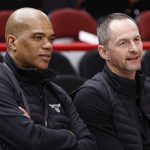 Apr 22, 2022; Chicago, Illinois, USA; Chicago Bulls executive vice president of basketball operations Arturas Karnisovas (right) talks with general manager Marc Eversley (left) before game three of the first round for the 2022 NBA playoffs against the Milwaukee Bucks at United Center.