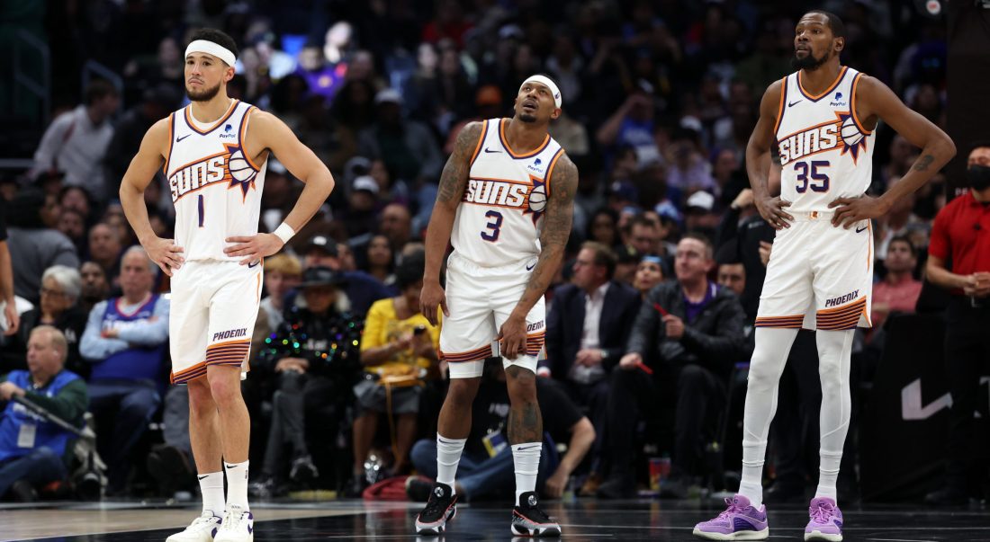 Jan 8, 2024; Los Angeles, California, USA; Phoenix Suns guard Devin Booker (1) and guard Bradley Beal (3) and forward Kevin Durant (35) stands on the floor during the fourth quarter against the Los Angeles Clippers at Crypto.com Arena. Mandatory Credit: Kiyoshi Mio-USA TODAY Sports
