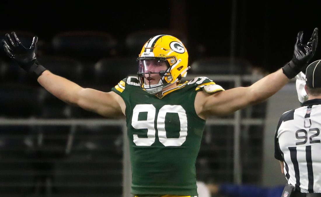 Green Bay Packers linebacker Lukas Van Ness (90) reacts against the Dallas Cowboys during the fourth quarter of their wild card playoff game Sunday, January 14, 2024 at AT&T Stadium in Arlington, Texas. Green Bay defeated Dallas 48-32.