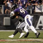 Sep 15, 2024; Baltimore, Maryland, USA; Baltimore Ravens linebacker Odafe Oweh (99) sacks Las Vegas Raiders quarterback Gardner Minshew (15) during the first quarter at M&T Bank Stadium. Mandatory Credit: Tommy Gilligan-Imagn Images