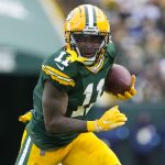 Jan 5, 2025; Green Bay, Wisconsin, USA; Green Bay Packers wide receiver Jayden Reed (11) during the game against the Chicago Bears at Lambeau Field. Mandatory Credit: