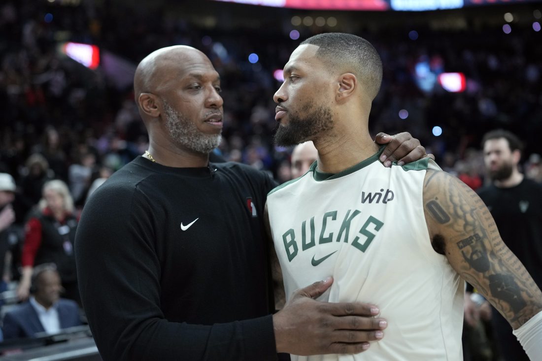 Jan 28, 2025; Portland, Oregon, USA; Portland Trail Blazers head coach Chauncey Billups embraces Milwaukee Bucks point guard Damian Lillard (0, right) after a game at Moda Center. Mandatory Credit: Soobum Im-Imagn Images