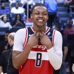 Apr 13, 2025; Miami, Florida, USA; Washington Wizards guard Bub Carrington (8) reacts after the Wizards win against the Miami Heat at Kaseya Center. Mandatory Credit: Rhona Wise-Imagn Images