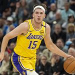 Apr 25, 2025; Minneapolis, Minnesota, USA; Los Angeles Lakers guard Austin Reaves (15) dribbles the ball against the Minnesota Timberwolves during game three of first round for the 2024 NBA Playoffs at Target Center.