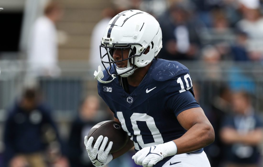 Apr 26, 2025; University Park, PA, USA; Penn State Nittany Lions running back Nicholas Singleton (10) runs a play during a warm up prior to the Blue White spring game at Beaver Stadium.