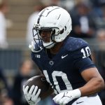 Apr 26, 2025; University Park, PA, USA; Penn State Nittany Lions running back Nicholas Singleton (10) runs a play during a warm up prior to the Blue White spring game at Beaver Stadium.