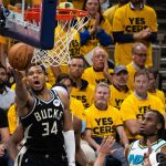 Apr 29, 2025; Indianapolis, Indiana, USA; Milwaukee Bucks forward Giannis Antetokounmpo (34) shoots the ball while Indiana Pacers guard Andrew Nembhard (2) defends during game five of the first round for the 2024 NBA Playoffs at Gainbridge Fieldhouse.
