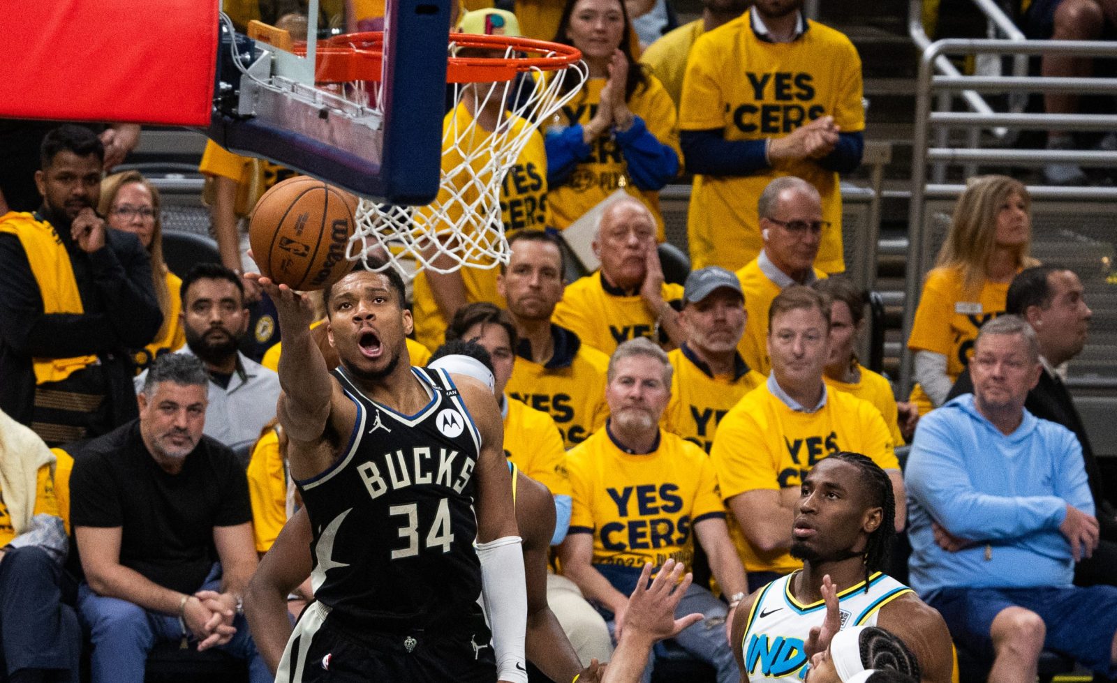 Apr 29, 2025; Indianapolis, Indiana, USA; Milwaukee Bucks forward Giannis Antetokounmpo (34) shoots the ball while Indiana Pacers guard Andrew Nembhard (2) defends during game five of the first round for the 2024 NBA Playoffs at Gainbridge Fieldhouse.