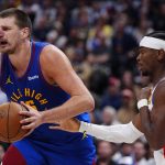 May 9, 2025; Denver, Colorado, USA; Oklahoma City Thunder guard Shai Gilgeous-Alexander (2) defends on Denver Nuggets center Nikola Jokic (15) in the second half during game three of the second round for the 2025 NBA Playoffs at Ball Arena.