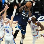 May 26, 2025; Minneapolis, Minnesota, USA; Minnesota Timberwolves guard Anthony Edwards (5) attempts to make a pass against Oklahoma City Thunder guard Alex Caruso (9), guard Luguentz Dort (5) and forward Chet Holmgren (7) in the first half during game four of the western conference finals for the 2025 NBA Playoffs at Target Center.