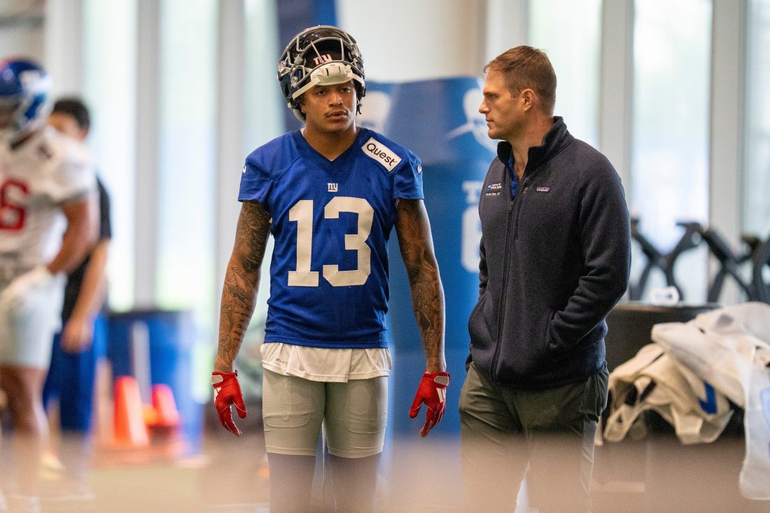New York Giants wide receiver Jalin Hyatt (13) talks with an assistant coach during Mandatory Minicamp at Quest Diagnostics Giants Training Center in East Rutherford on Tuesday, June 17, 2025.