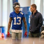 New York Giants wide receiver Jalin Hyatt (13) talks with an assistant coach during Mandatory Minicamp at Quest Diagnostics Giants Training Center in East Rutherford on Tuesday, June 17, 2025.