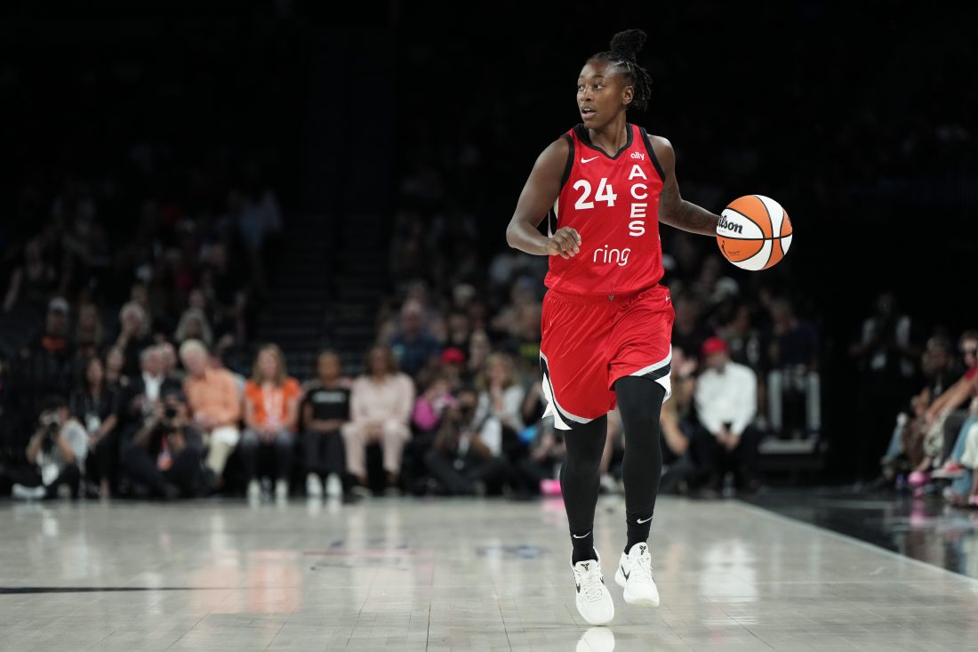 Jun 20, 2025; Las Vegas, Nevada, USA; Las Vegas Aces guard Jewell Loyd (24) dribbles the ball during the first half of an WNBA basketball game against the Seattle Storm at Michelob Ultra Arena.