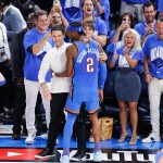 Jun 22, 2025; Oklahoma City, Oklahoma, USA; Oklahoma City Thunder guard Shai Gilgeous-Alexander (2) celebrates with Oklahoma City Thunder head coach Mark Daigneault during the fourth quarter of game seven of the 2025 NBA Finals against the Indiana Pacers at Paycom Center.