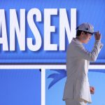 Jun 25, 2025; Brooklyn, NY, USA; Yang Hansen looks on after being selected as the 16th pick by the Memphis Grizzlies in the first round of the 2025 NBA Draft at Barclays