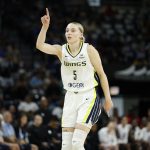 Jul 9, 2025; Chicago, Illinois, USA; Dallas Wings guard Paige Bueckers (5) reacts after scoring against the Chicago Sky during the first half at Wintrust Arena. Mandatory Credit: Kamil Krzaczynski-Imagn Images