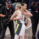 Indiana Fever guard Caitlin Clark (22) and Dallas Wings guard Paige Bueckers (5) hug Sunday, July 13, 2025, ahead of the game at Gainbridge Fieldhouse in Indianapolis.