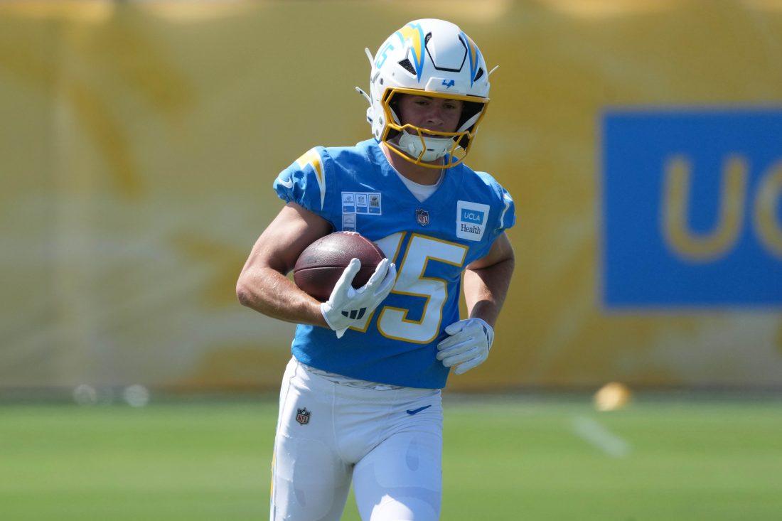 Jul 17, 2025; El Segundo, CA, USA; Los Angeles Chargers receiver Ladd McConkey (15) carries the ball during training camp at The Bolt. Mandatory Credit: Kirby Lee-Imagn Images