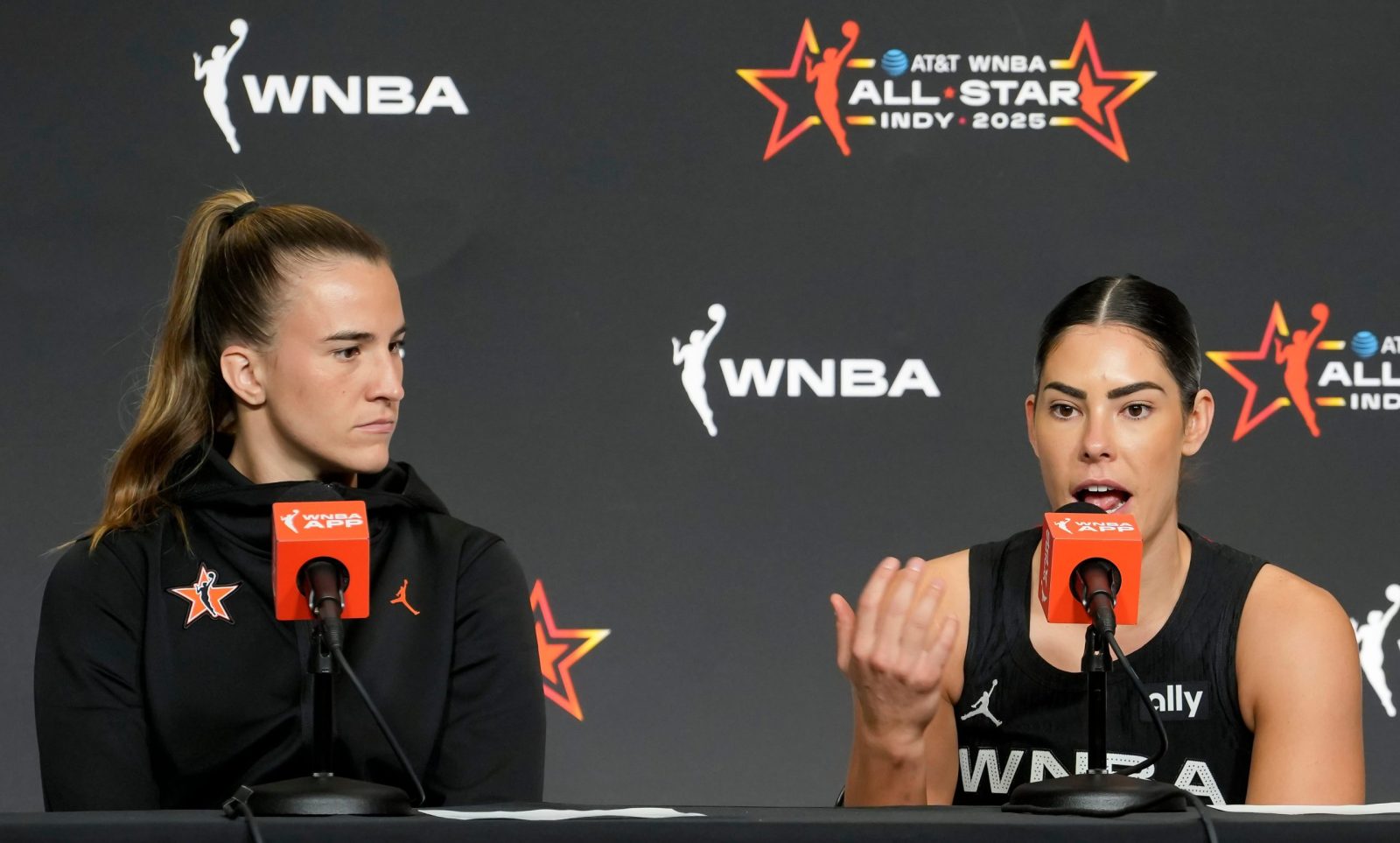 Sabrina Ionescu (left) and Kelsey Plum answers questions Saturday, July 19, 2025, at a press conference after the WNBA All-Star Game at Gainbridge Fieldhouse in Indianapolis.