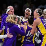 Jul 26, 2025; Brooklyn, New York, USA; Los Angeles Sparks forward Rickea Jackson (2) celebrates with teammates after scoring the game winning basket at the buzzer during the second half against the New York Liberty at Barclays Center.