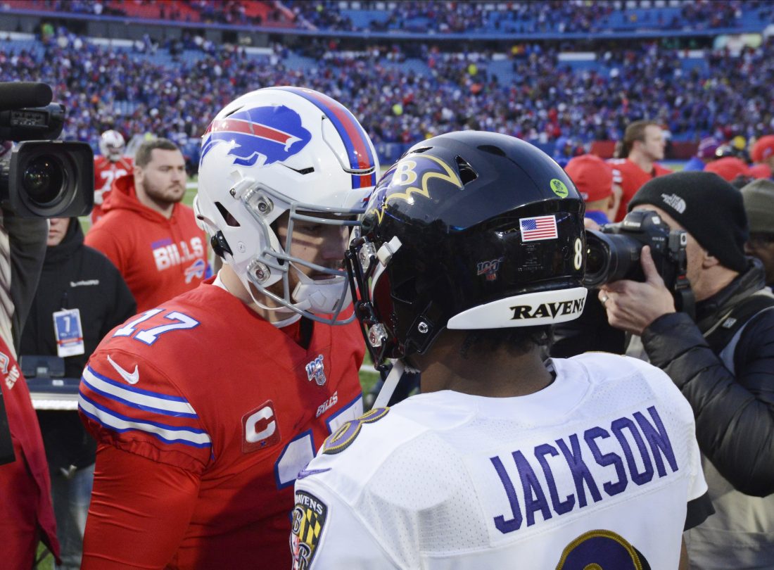 Dec 8, 2019; Orchard Park, NY, USA; Buffalo Bills quarterback Josh Allen (17) meets Baltimore Ravens quarterback Lamar Jackson (8) at mid-field after a game at New Era Field. Mandatory Credit: Mark Konezny-USA TODAY Sports