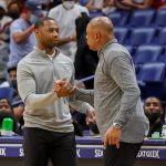 Oct 20, 2021; New Orleans, Louisiana, USA; Philadelphia 76ers head coach Doc Rivers shakers hands with New Orleans Pelicans head coach Willie Green after the game at Smoothie King Center. Mandatory Credit: Stephen Lew-USA TODAY Sports