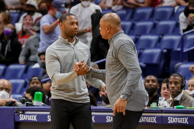 Oct 20, 2021; New Orleans, Louisiana, USA; Philadelphia 76ers head coach Doc Rivers shakers hands with New Orleans Pelicans head coach Willie Green after the game at Smoothie King Center. Mandatory Credit: Stephen Lew-USA TODAY Sports