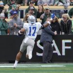 Sep 10, 2022; Fort Collins, Colorado, USA; Middle Tennessee Blue Raiders safety Tra Fluellen (17) scores a pick six touchdown on the first play from scrimmage at Sonny Lubick Field at Canvas Stadium. Mandatory Credit: Michael Madrid-USA TODAY Sports