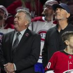 Feb 16, 2023; Raleigh, North Carolina, USA; Carolina Hurricanes GM Don Waddell and Hurricanes owner Tom Dundon look on during the retirement of Cam Ward jersey before the game against the Montreal Canadiens at PNC Arena. Mandatory Credit: James Guillory-USA TODAY Sports