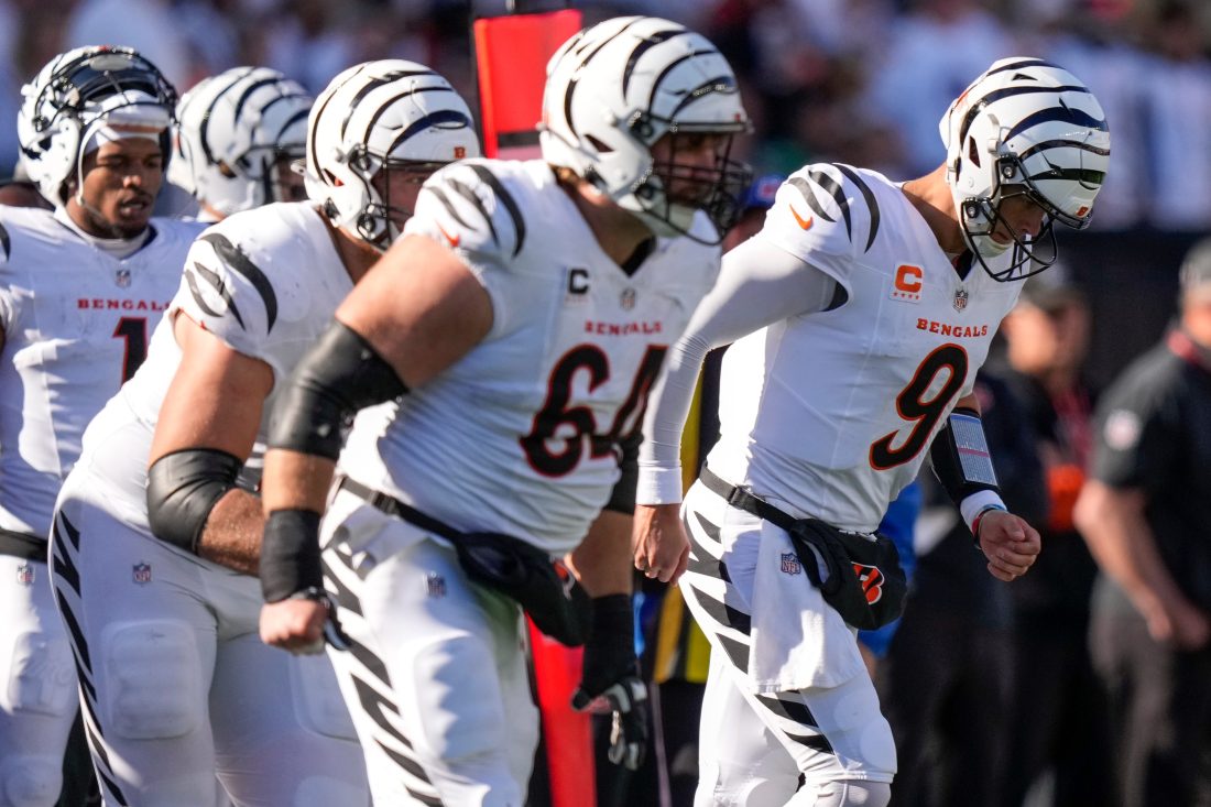 Cincinnati Bengals quarterback Joe Burrow (9) leads the offense onto the field in the fourth quarter of the NFL Week 8 game between the Cincinnati Bengals and the Philadelphia Eagles at Paycor Stadium in downtown Cincinnati on Sunday, Oct. 27, 2024. The Bengals fell to 3-5 on the season with a 37-17 loss to the Eagles at home.