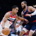 Nov 27, 2024; Washington, District of Columbia, USA; Washington Wizards guard Malcolm Brogdon (15) drives to the basket against LA Clippers guard Amir Coffey (7) during the second quarter at Capital One Arena.