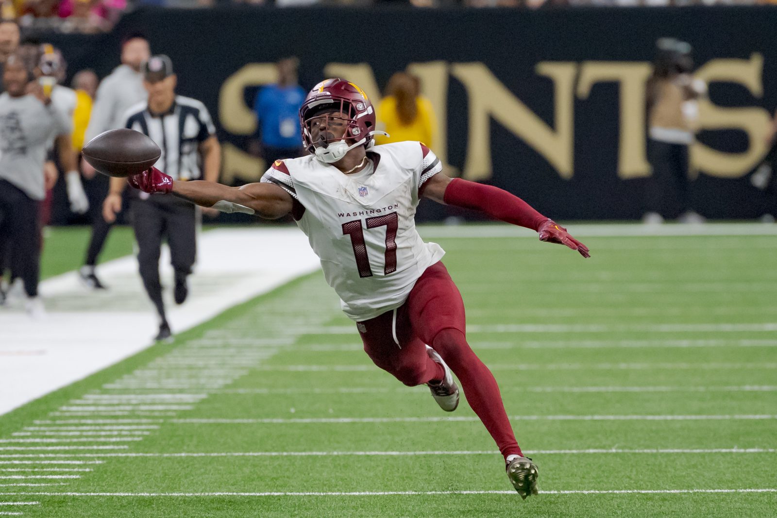 Dec 15, 2024; New Orleans, Louisiana, USA; Washington Commanders wide receiver Terry McLaurin (17) misses a catch during the second half against the New Orleans Saints at Caesars Superdome.