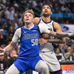 Feb 10, 2025; Dallas, Texas, USA; Dallas Mavericks center Kylor Kelley (50) and Sacramento Kings forward Trey Lyles (41) look for the ball during the second half at the American Airlines Center. Mandatory Credit: Jerome Miron-Imagn Images