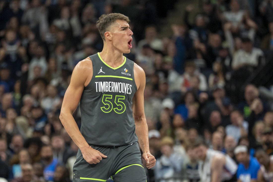 Feb 23, 2025; Minneapolis, Minnesota, USA; Minnesota Timberwolves center Luka Garza (55) reacts after making a three point shot against the Oklahoma City Thunder in the second half at Target Center. Mandatory Credit: Jesse Johnson-Imagn Images