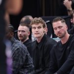 Mar 27, 2025; Salt Lake City, Utah, USA; Utah Jazz forward Lauri Markkanen (center) watches the game from the bench during the second half of the game against the Houston Rockets at Delta Center. Mandatory Credit: Rob Gray-Imagn Images