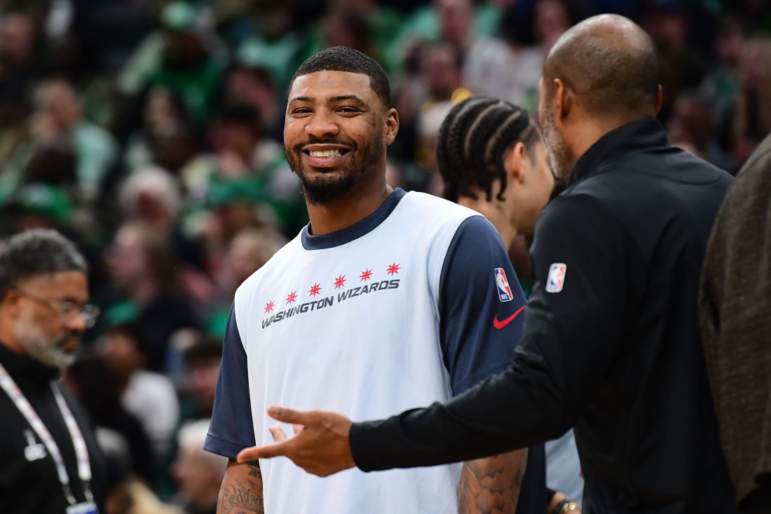 Apr 6, 2025; Boston, Massachusetts, USA; Washington Wizards guard Marcus Smart (36) smiles during a timeout in the first half again the Boston Celtics at TD Garden. Mandatory Credit: Bob DeChiara-Imagn Images