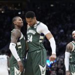 Apr 8, 2025; Milwaukee, Wisconsin, USA; Milwaukee Bucks guard Kevin Porter Jr. (3) and Milwaukee Bucks forward Giannis Antetokounmpo (34) celebrate as the clock winds down in their 110-103 comeback victory over the Minnesota Timberwolves at Fiserv Forum. Mandatory Credit: Michael McLoone-Imagn Images