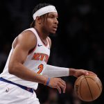 Apr 13, 2025; Brooklyn, New York, USA; New York Knicks guard Miles McBride (2) dribbles up court during the first half against the Brooklyn Nets at Barclays Center. Mandatory Credit: Vincent Carchietta-Imagn Images