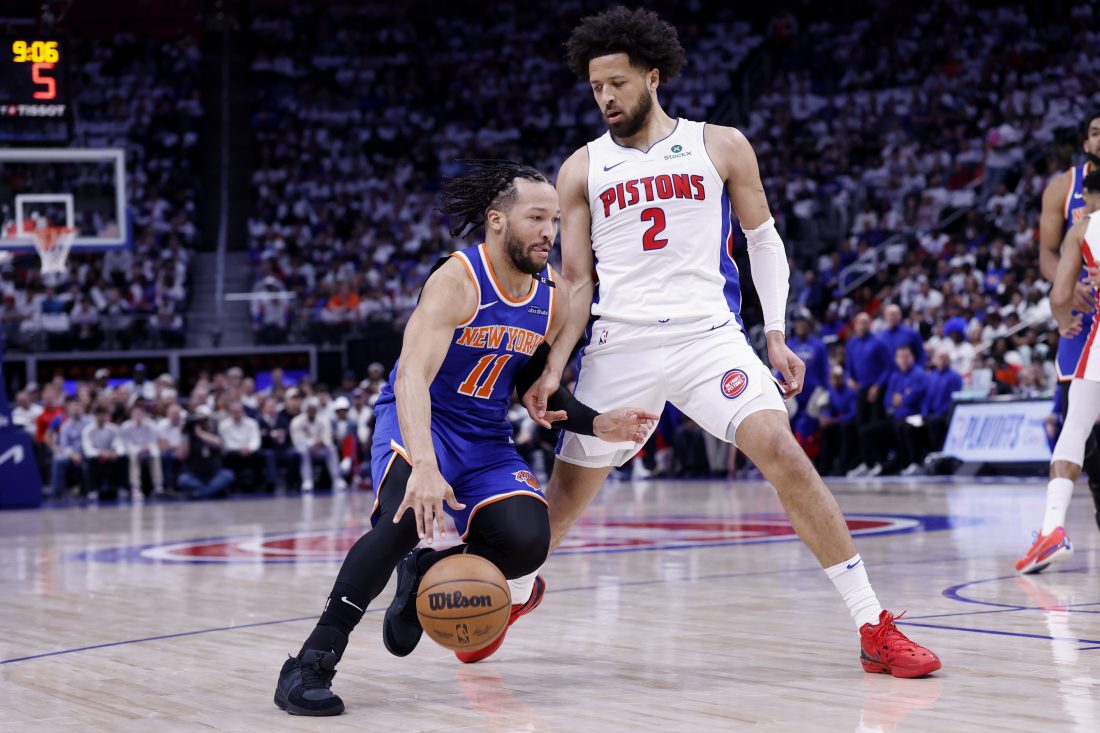 May 1, 2025; Detroit, Michigan, USA; New York Knicks guard Jalen Brunson (11) dribbles defended by Detroit Pistons guard Cade Cunningham (2) in the first half during game six of first round for the 2024 NBA Playoffs at Little Caesars Arena. Mandatory Credit: Rick Osentoski-Imagn Images