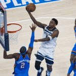 May 22, 2025; Oklahoma City, Oklahoma, USA; Minnesota Timberwolves guard Anthony Edwards (5) drives against Oklahoma City Thunder guard Shai Gilgeous-Alexander (2) in the fourth quarter during game two of the western conference finals for the 2025 NBA Playoffs at Paycom Center.