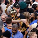 Jun 22, 2025; Oklahoma City, Oklahoma, USA; Oklahoma City Thunder forward Chet Holmgren (7) holds the NBA Finals Larry O'Brien Championship Trophy at the end of game seven of the 2025 NBA Finals at Paycom Center. Mandatory Credit: Alonzo Adams-Imagn Images