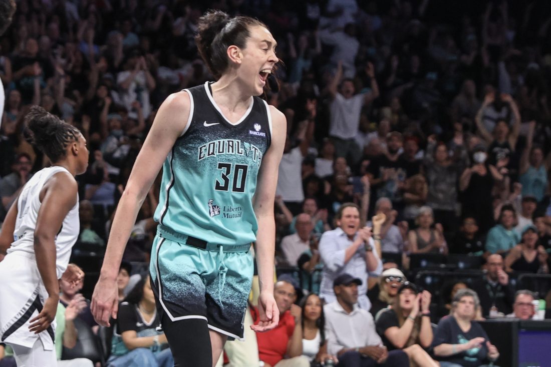 Jul 8, 2025; Brooklyn, New York, USA; New York Liberty forward Breanna Stewart (30) celebrates in the third quarter against the Las Vegas Aces at Barclays Center. Mandatory Credit: Wendell Cruz-Imagn Images