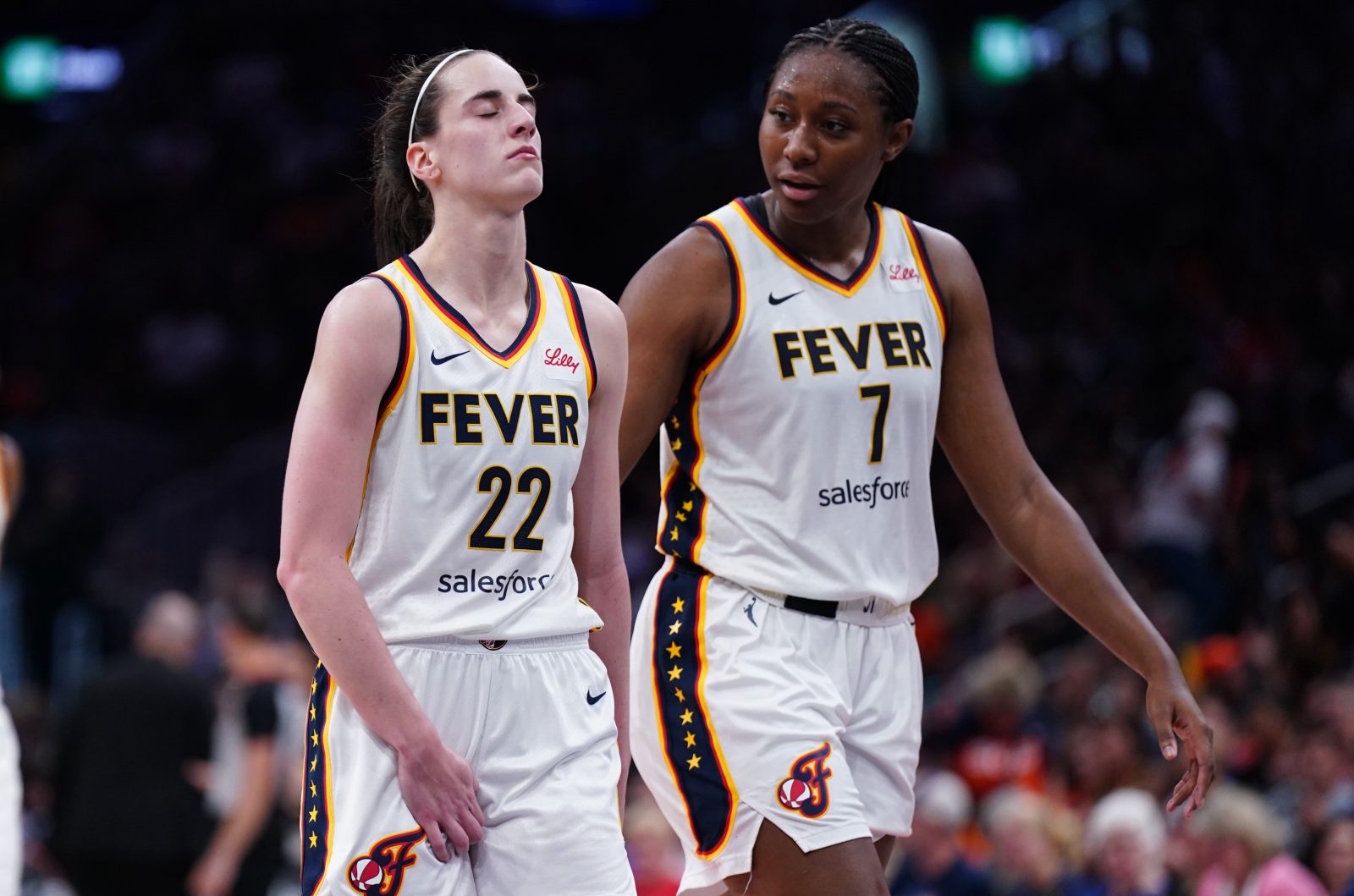 Jul 15, 2025; Boston, Massachusetts, USA; Indiana Fever guard Caitlin Clark (22) reacts with a possible injury after a play against the Connecticut Sun in the second half at TD Garden. Mandatory Credit: David Butler II-Imagn Images