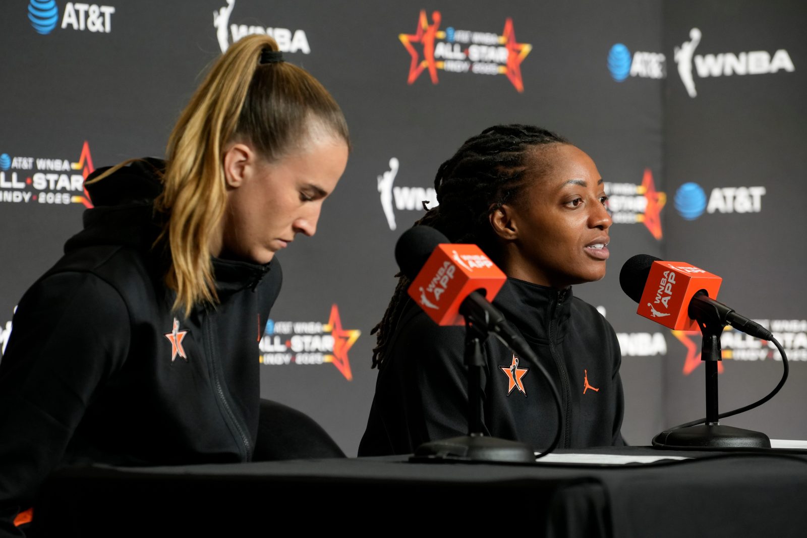 Sabrina Ionescu (left) and Kelsey Mitchell answers questions Saturday, July 19, 2025, at a press conference after the WNBA All-Star Game at Gainbridge Fieldhouse in Indianapolis