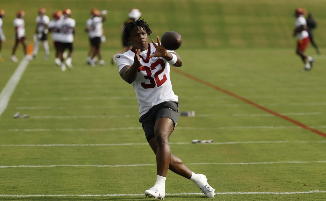 Jul 23, 2025; Ashburn, VA, USA; Washington Commanders running back Jacory Croskey-Merritt (32) catches a ball during practice on day one of training camp at OrthoVirginia Training Center at Commanders Park.