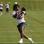 Jul 23, 2025; Ashburn, VA, USA; Washington Commanders running back Jacory Croskey-Merritt (32) catches a ball during practice on day one of training camp at OrthoVirginia Training Center at Commanders Park.