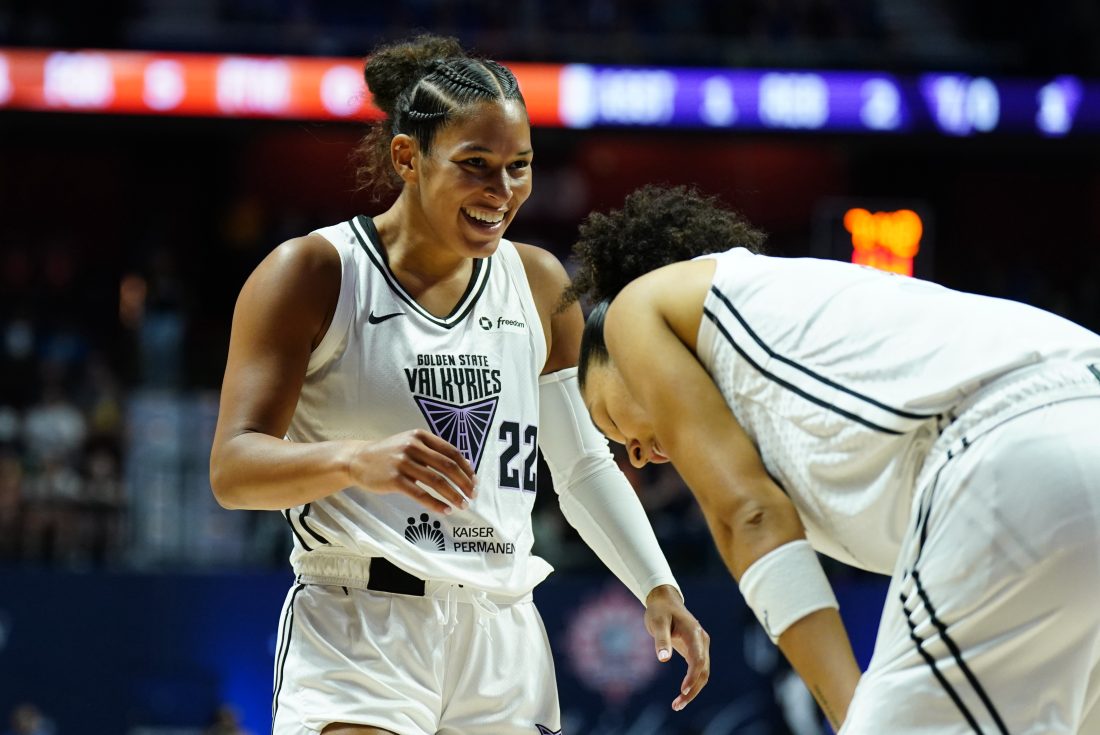 Jul 27, 2025; Uncasville, Connecticut, USA; Golden State Valkyries guard Veronica Burton (22) reacts with forward Janelle Salaun (13) after a play against the Connecticut Sun in the first half at Mohegan Sun Arena. Mandatory Credit: David Butler II-Imagn Images