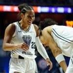 Jul 27, 2025; Uncasville, Connecticut, USA; Golden State Valkyries guard Veronica Burton (22) reacts with forward Janelle Salaun (13) after a play against the Connecticut Sun in the first half at Mohegan Sun Arena. Mandatory Credit: David Butler II-Imagn Images